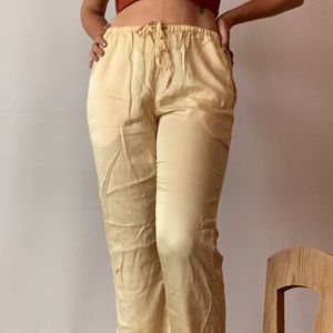 Artisan-made buttery soft pants in buttery yellow